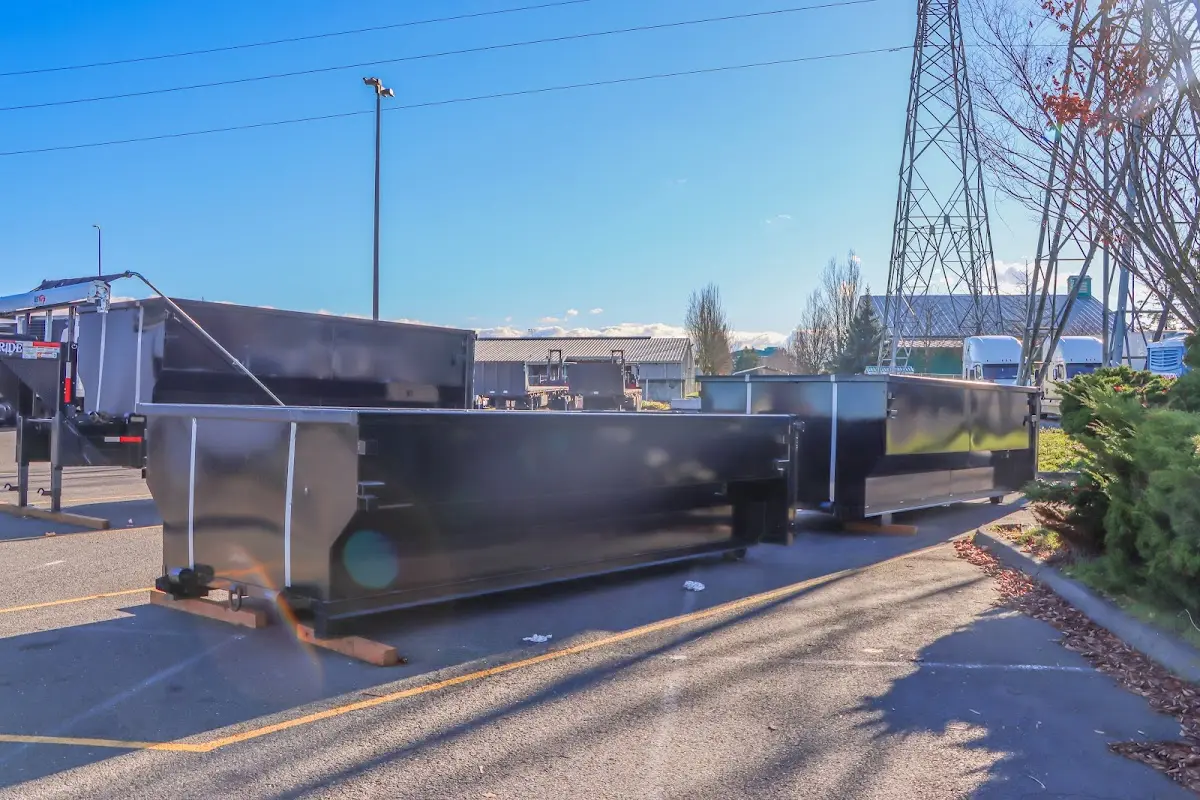 Roll-off dumpster ready for waste disposal at job site for Concrete Dumpster Rental in Port Townsend